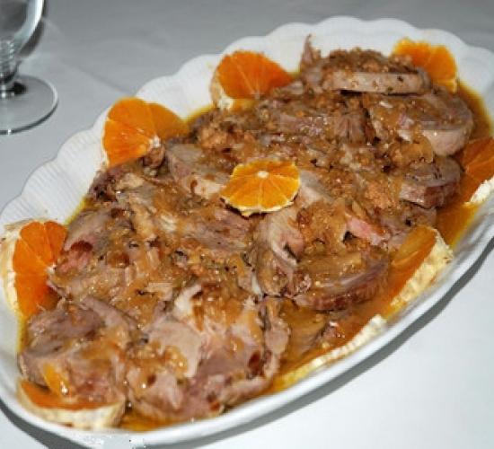 Rotolo di maiale arancia e grappa